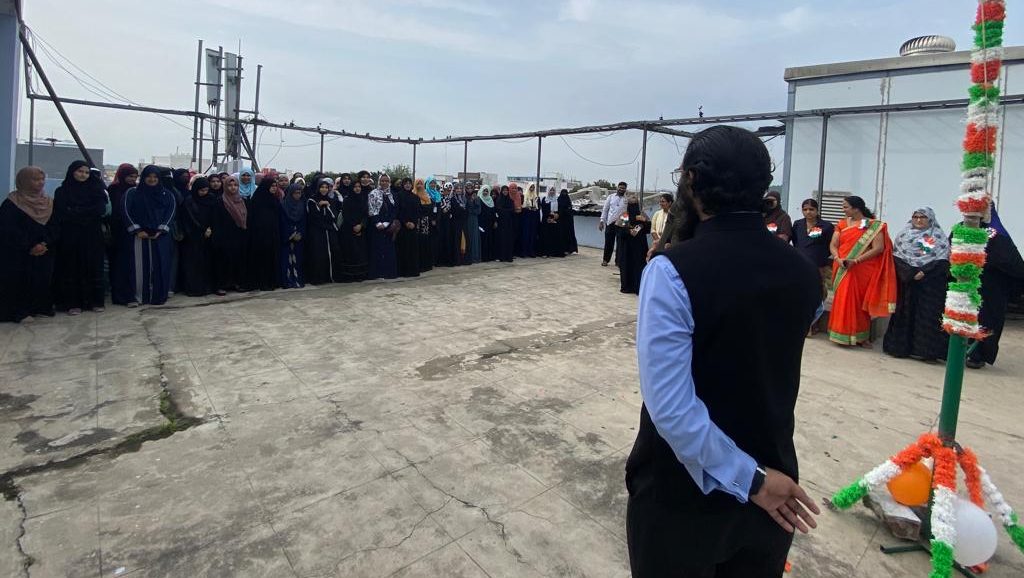 Students of Gyanam Junior College celebrating Independence Day with flag hoisting ceremony